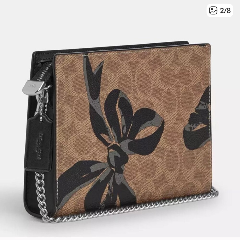 Coach Brown Bow Print Crossbody Bag 
Brand new but tag is removed 
Never used - Picture 9 of 10